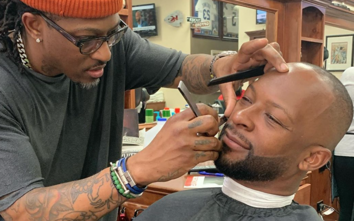 DeJuan shaves Dante Hall