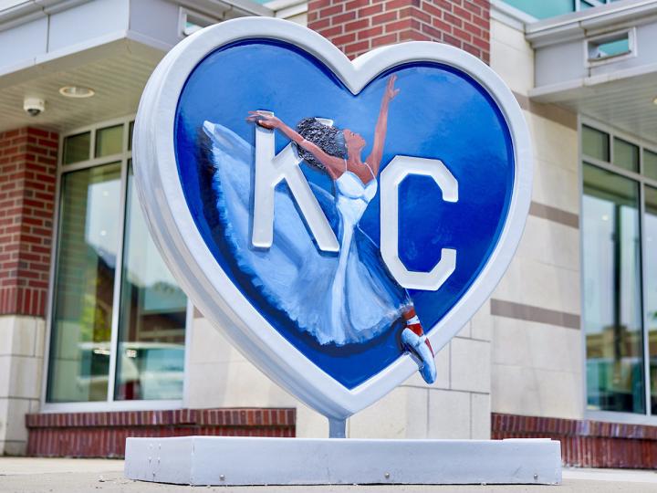 Large heart sculpture with "KC" and a ballerina.