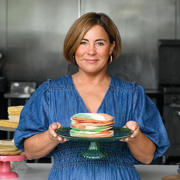 Marissa Gencarelli of Yoli Tortilleria holding a plate of tortillas.