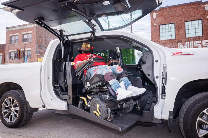 Will Smith getting into his custom handicap accessible truck